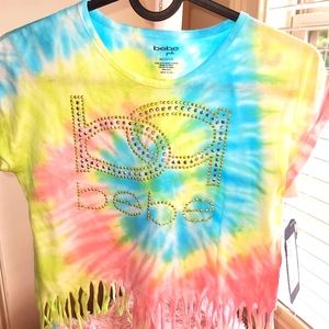 Tie-dyed fringed cropped bebe shirt with studded jeweled logo